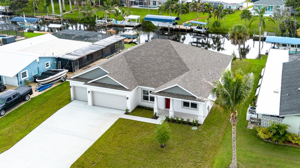 Photo of 798 SE Seahouse Drive, Port Saint Lucie, FL 34983 (MLS # B26063818)