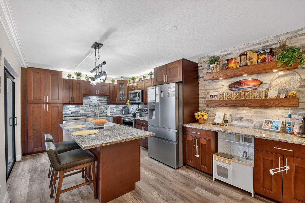 Photo of 1523 15th Lane #D, Greenacres, FL 33463 (MLS # R11165152)