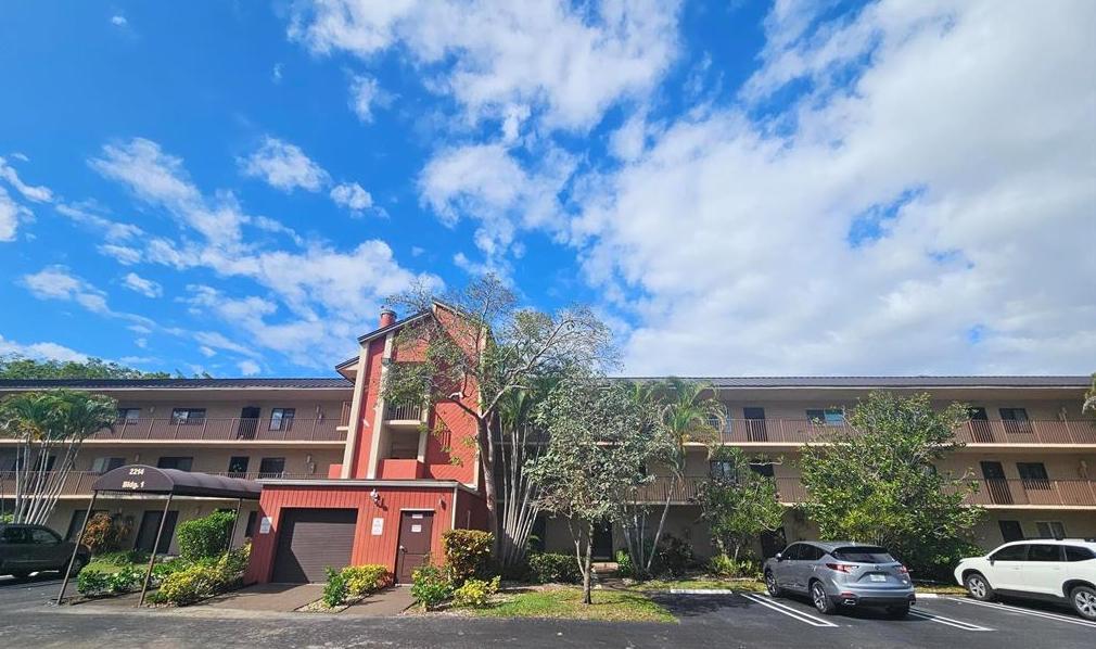 Photo of 2214 S Cypress Bend Drive #208, Pompano Beach, FL 33069 (MLS # B26031526)