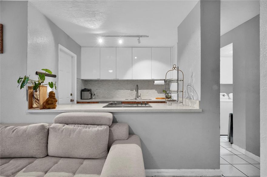 This charming 4-bedroom, 2-bathroom two story townhome is located in the desirable Villas at Cutler Ridge community of South Miami Heights.  Open living area on the main floor opens to a spacious kitchen which includes stainless steel appliances for the avid cook. Enjoy the exterior yard perfect for a nice garden and outdoor entertaining. Centrally located near shopping centers, restaurants, and major expressways, including the Turnpike and US 1.