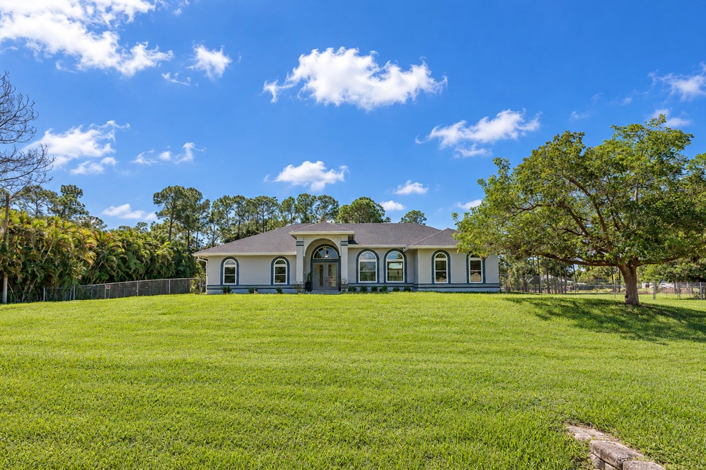 Photo of 17226 79th Court N, The Acreage, FL 33470 (MLS # B26088549)