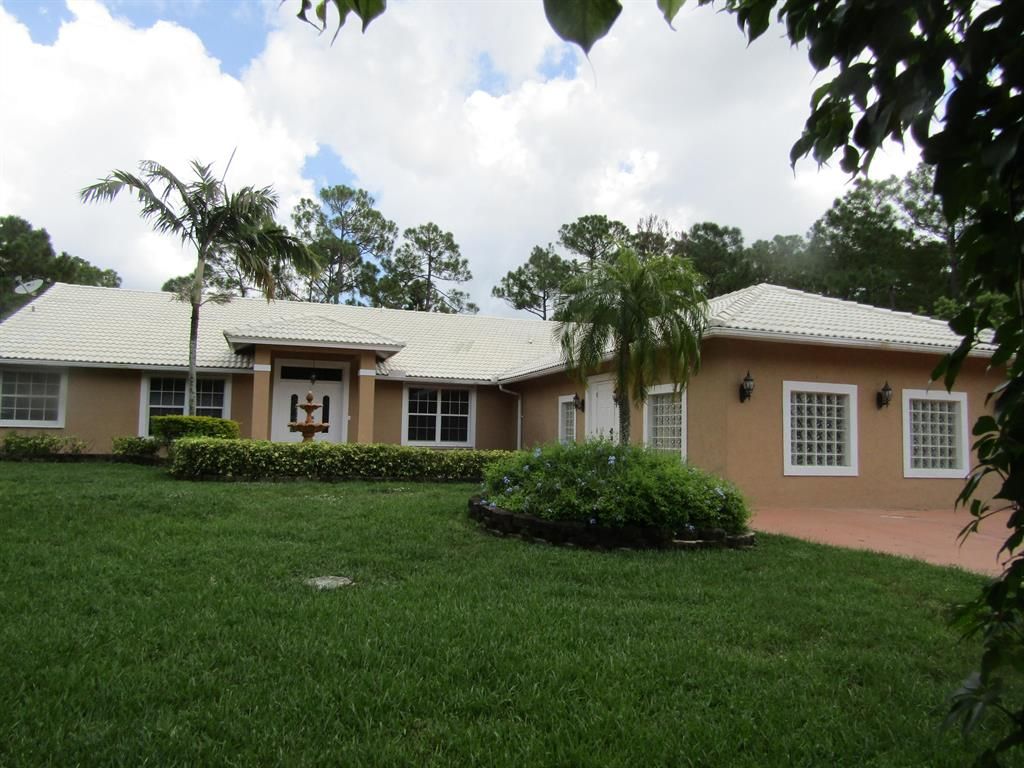 Photo of 16439 81st Lane N, The Acreage, FL 33470 (MLS # R10743651)