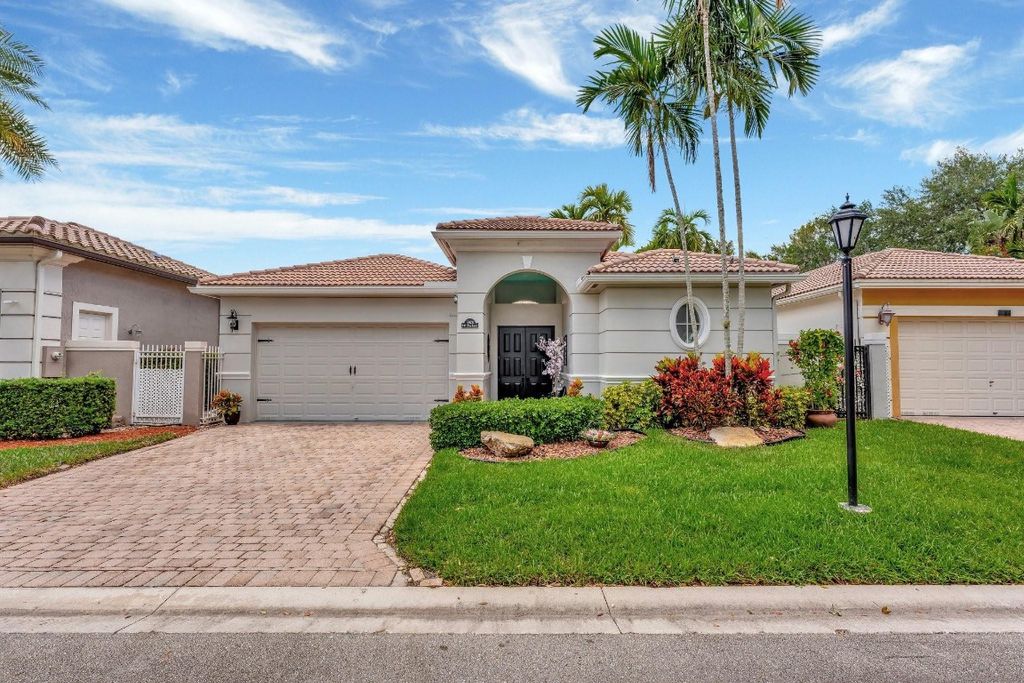 Photo of 5928 NW 123rd Avenue, Coral Springs, FL 33076 (MLS # F10499542)