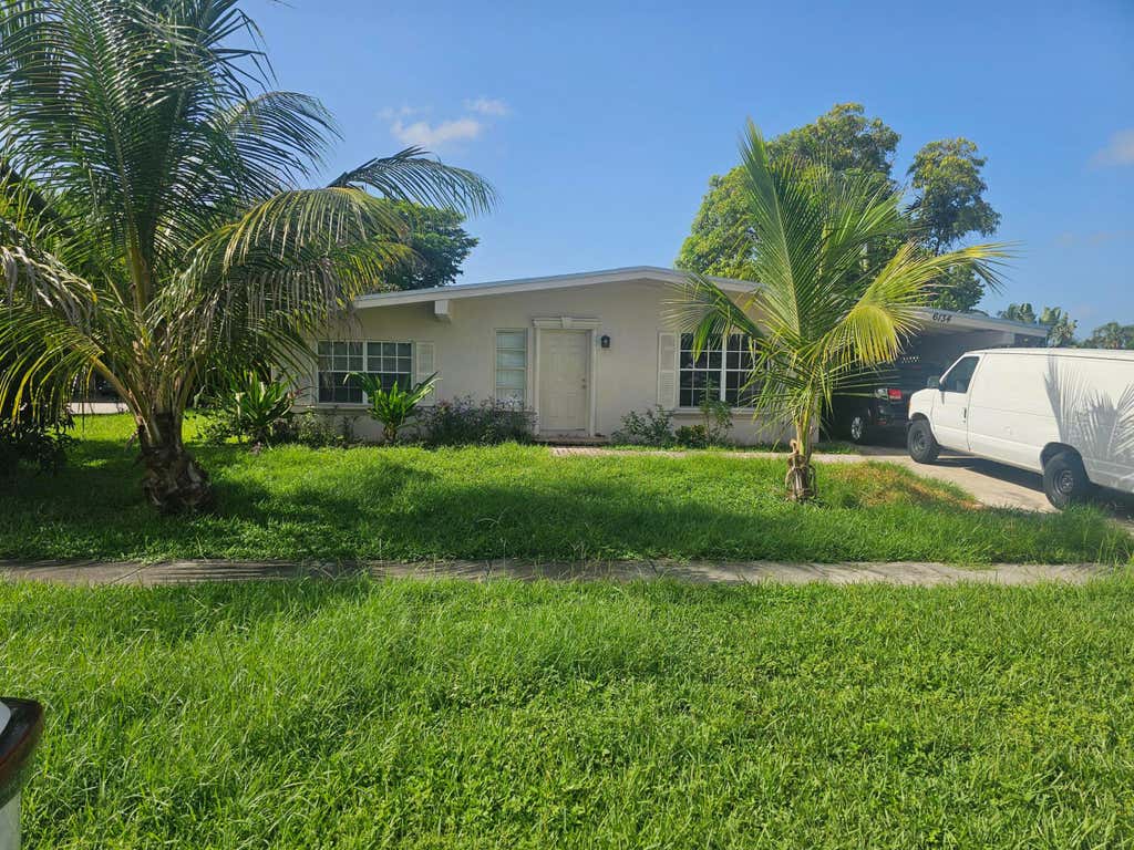 Photo of 6134 HOGAN CREEK Road, Margate, FL 33063 (MLS # B26065033)