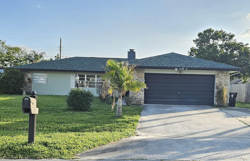 Photo of 424 SE Skipper Lane, Port Saint Lucie, FL 34983 (MLS # B26023070)