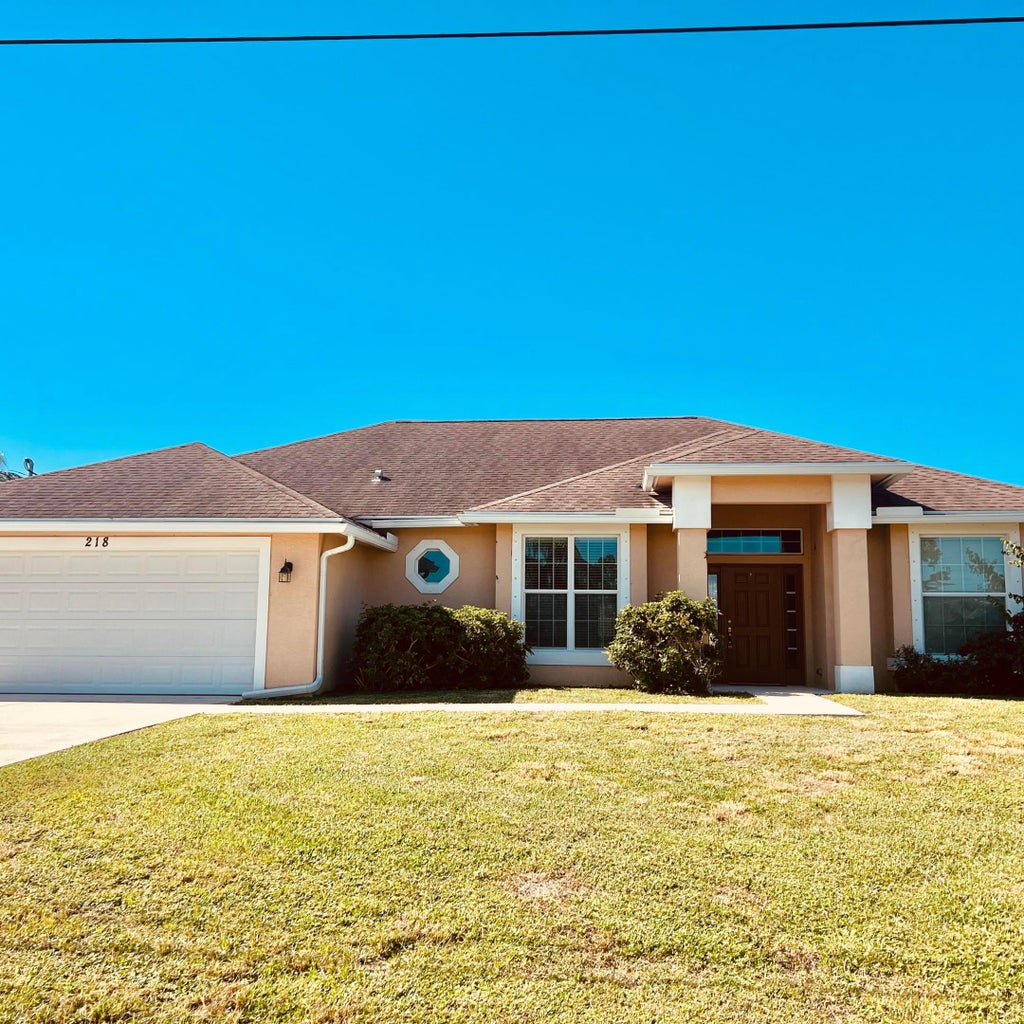 Photo of 218 SW RIDGECREST Drive, Port Saint Lucie, FL 34953 (MLS # B26081549)