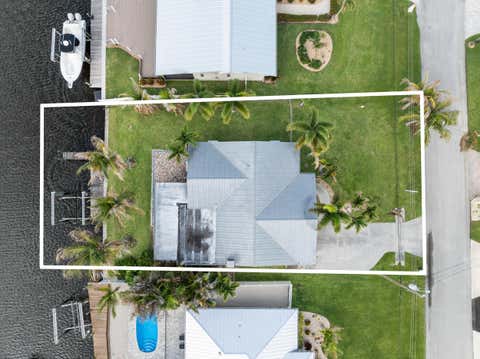 Photo of 1459 SW Seahawk Way, Palm City, FL 34990 (MLS # B26020731)
