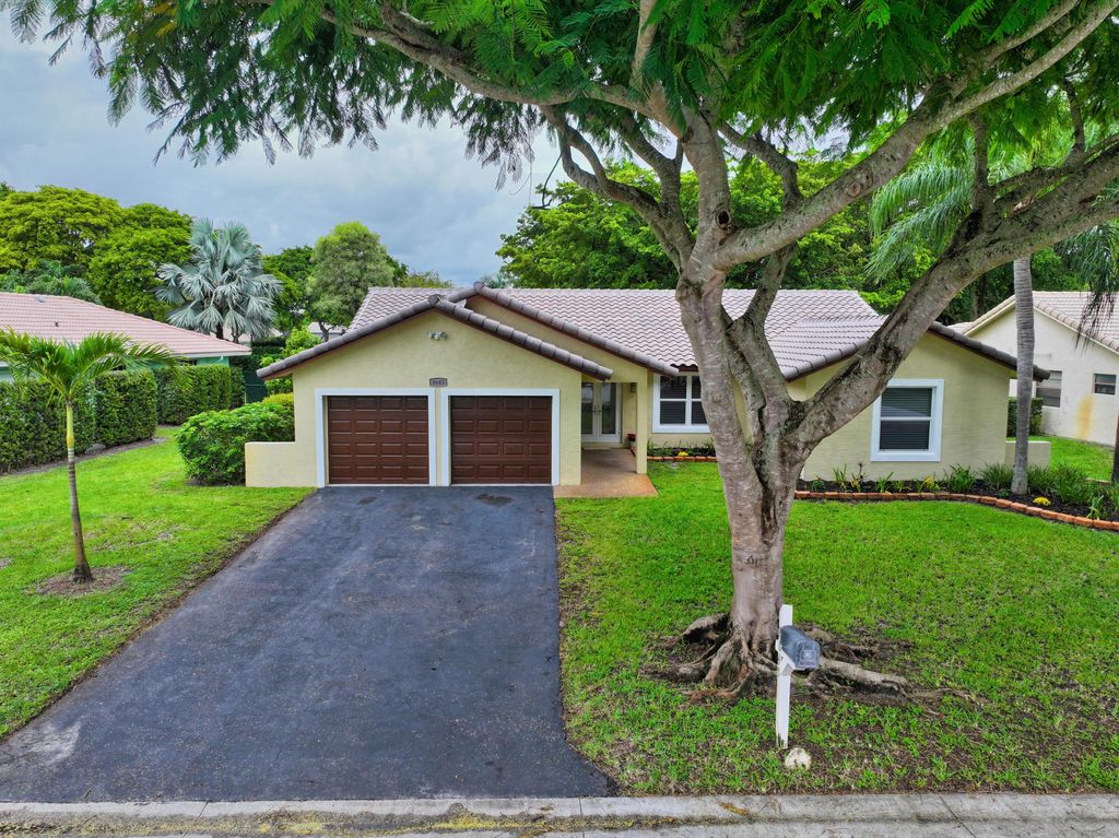 Photo of 8645 NW 47th Drive, Coral Springs, FL 33067 (MLS # B26011236)