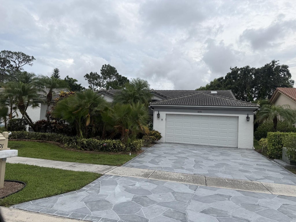 Photo of 8291 Lake Cypress Road, Lake Worth, FL 33467 (MLS # B26040097)