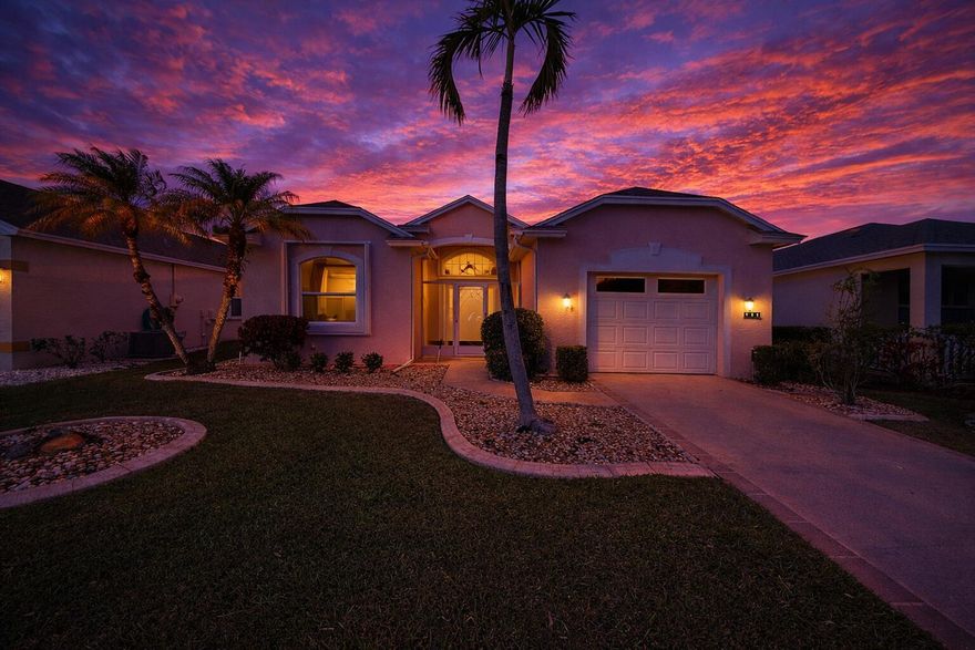 This lovely single family home in top 55+ community boasts light and bright open floor plan with large sliders that open to the large glassed in lanai with partial water view..  Fresh paint throughout, updated kitchen and flooring, accordion shutters with screened entry.   You will make friends fast in this busy community with 40+ clubs, activity director, ballroom, party room, gym, billiards, putting green, bocce, pickleball and tennis!  SELLER IS MOTIVATED, SET UP A SHOWING TODAY!!