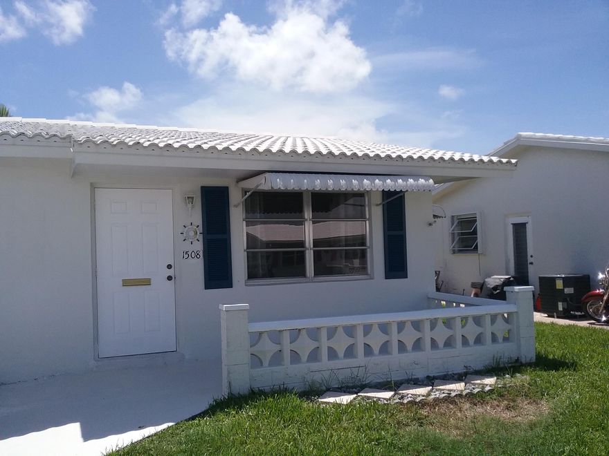 This nicely updated 2/1 in the desireable Leisureville subdivision is a must see. Tile throughout, great kitchen, newer AC, and a brand new breaker box to help keep things safe. Hurricane awnings on every window. Enjoy a quiet evening or entertain on the glassed-in porch. This development has too many amenities to mention. Just a few short minutes to I-95, the Turnpike, and the most diverse shopping area in South Florida. THIS IS A SENIOR COMMUNITY