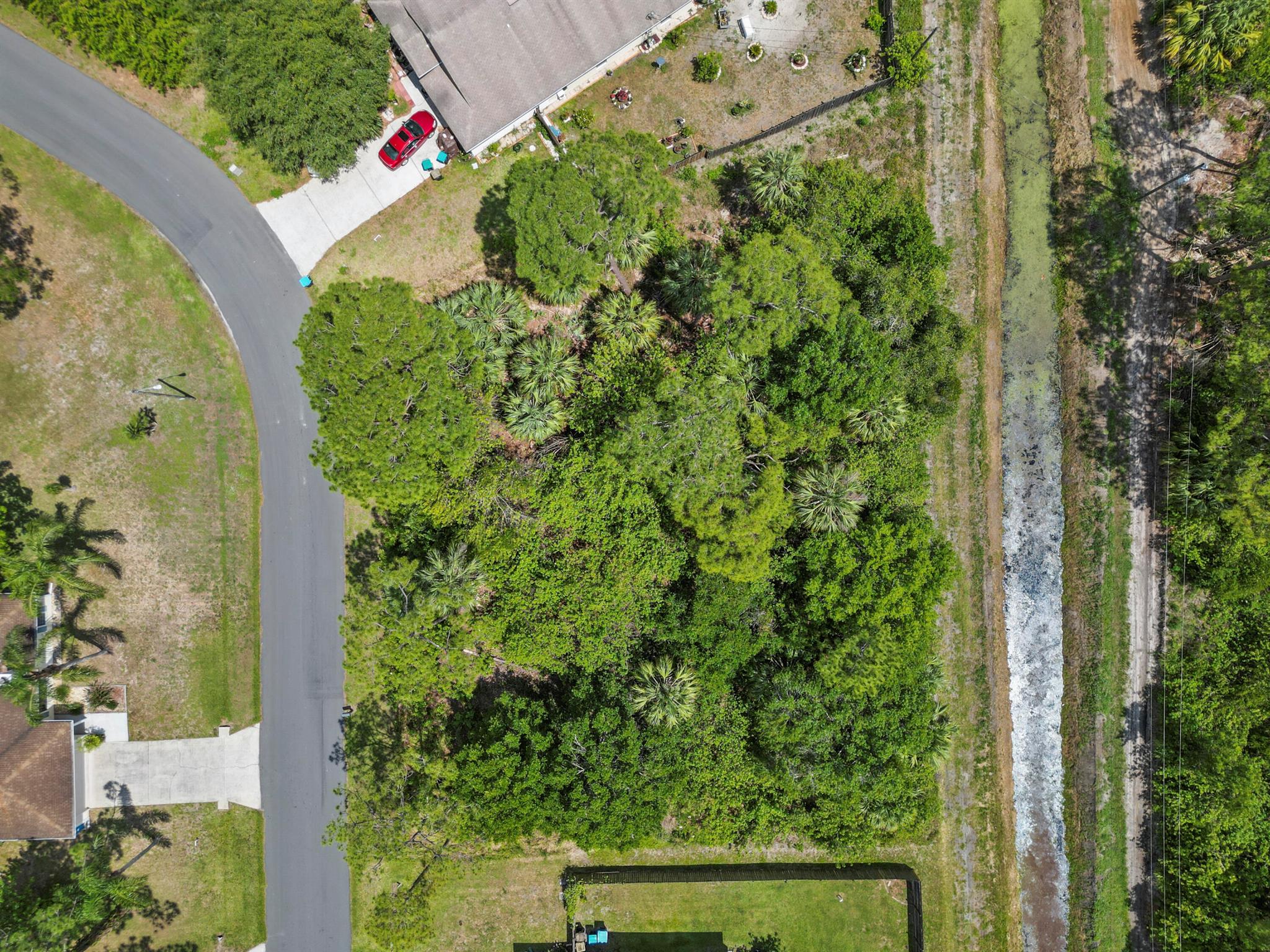 This is your chance to own this lot of 0.27 acres (11761 sqft) or buy the lot next door with it for your chance to own 2 side by side lots adding up to a total of half an acre lot. Irregular shaped lot that allows you to make the most out of your backyard (enough space for a pool and more). Up and coming area with no HOA and a great location that is minutes away from Publix, schools, all major stores and the i-95 ramp!