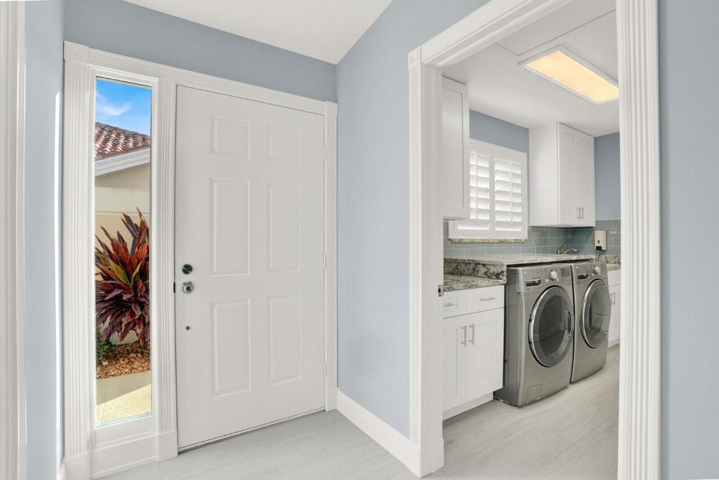 Photo of 2493 SW Parkside Drive, Palm City, FL 34990 (MLS # R11140603)