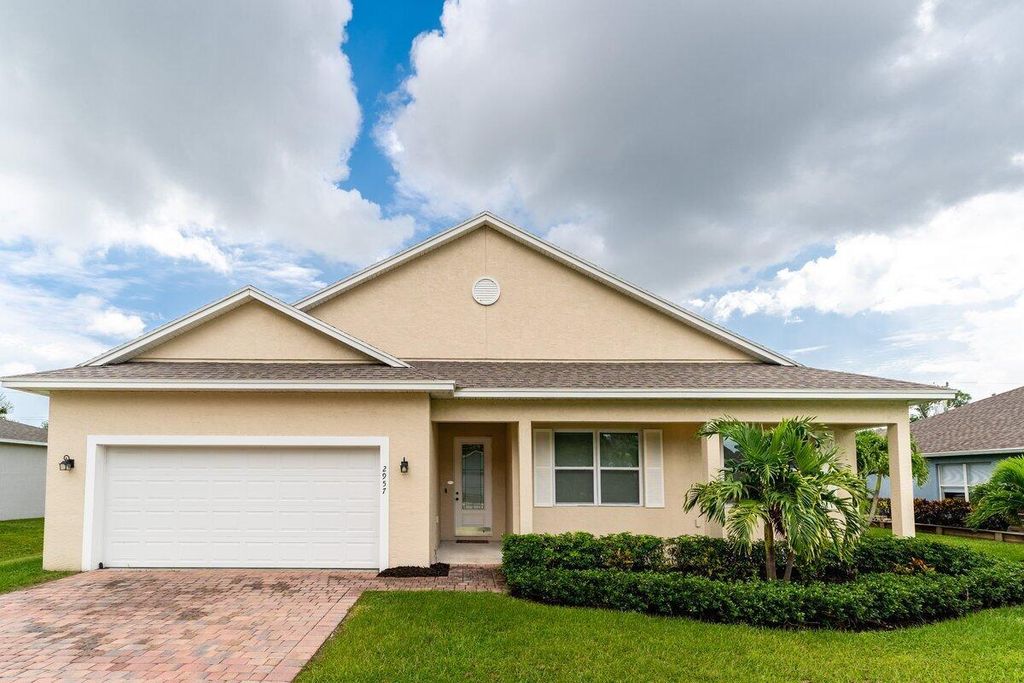 Photo of 2957 SW Ortega Street, Port St Lucie, FL 34953 (MLS # R10914697)