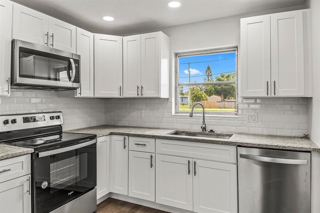 Photo of 9104 Artist Place Pl, Lake Worth Beach, FL 33467 (MLS # R10726082)