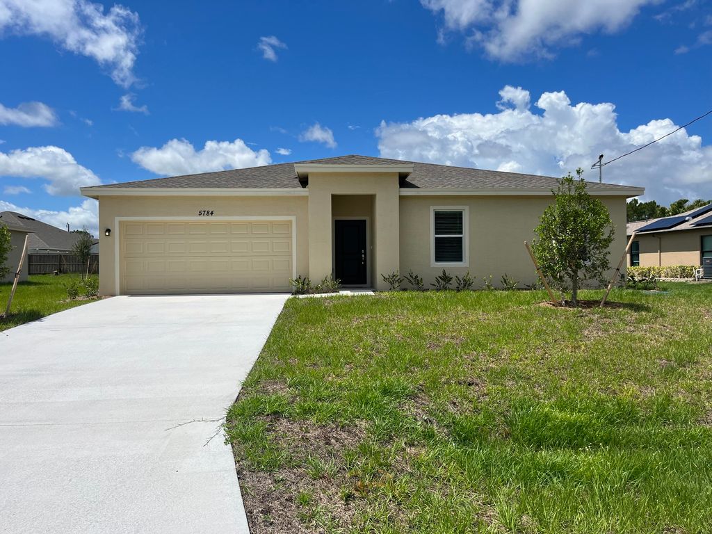 Photo of 5784 NW Erin Avenue, Port Saint Lucie, FL 34953 (MLS # R10805122)