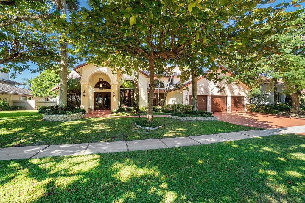 Photo of 4407 Woodfield Boulevard, Boca Raton, FL 33434 (MLS # R11130139)