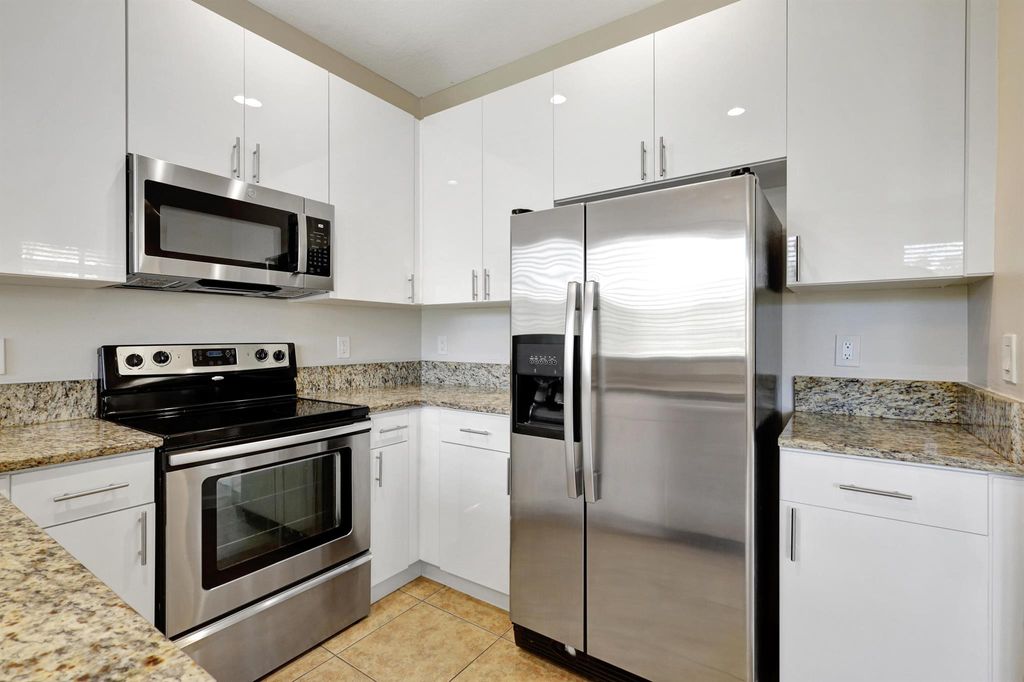 Photo of 4384 Berkshire Wharf Drive, Lake Worth, FL 33461 (MLS # R10980196)