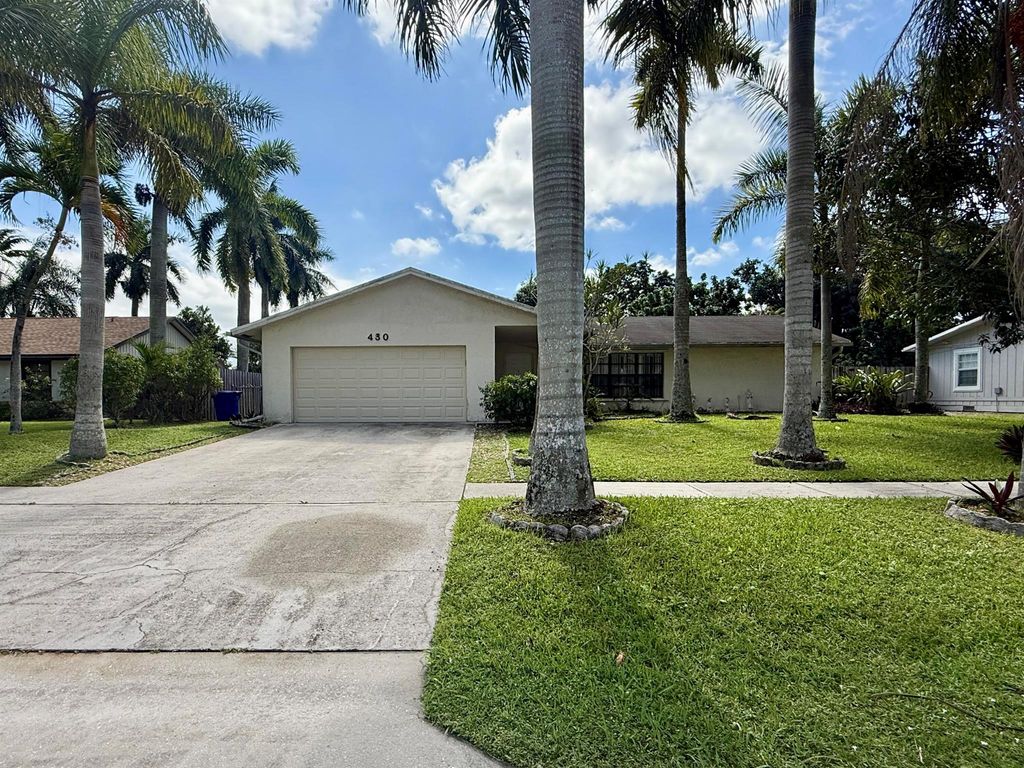 Photo of 430 La Mancha Avenue, Royal Palm Beach, FL 33411 (MLS # R11141905)