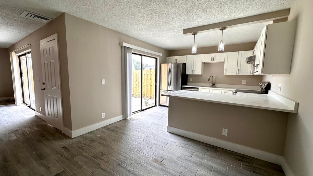 Photo of 213 Lake Arbor Drive, Palm Springs, FL 33461 (MLS # R10958597)
