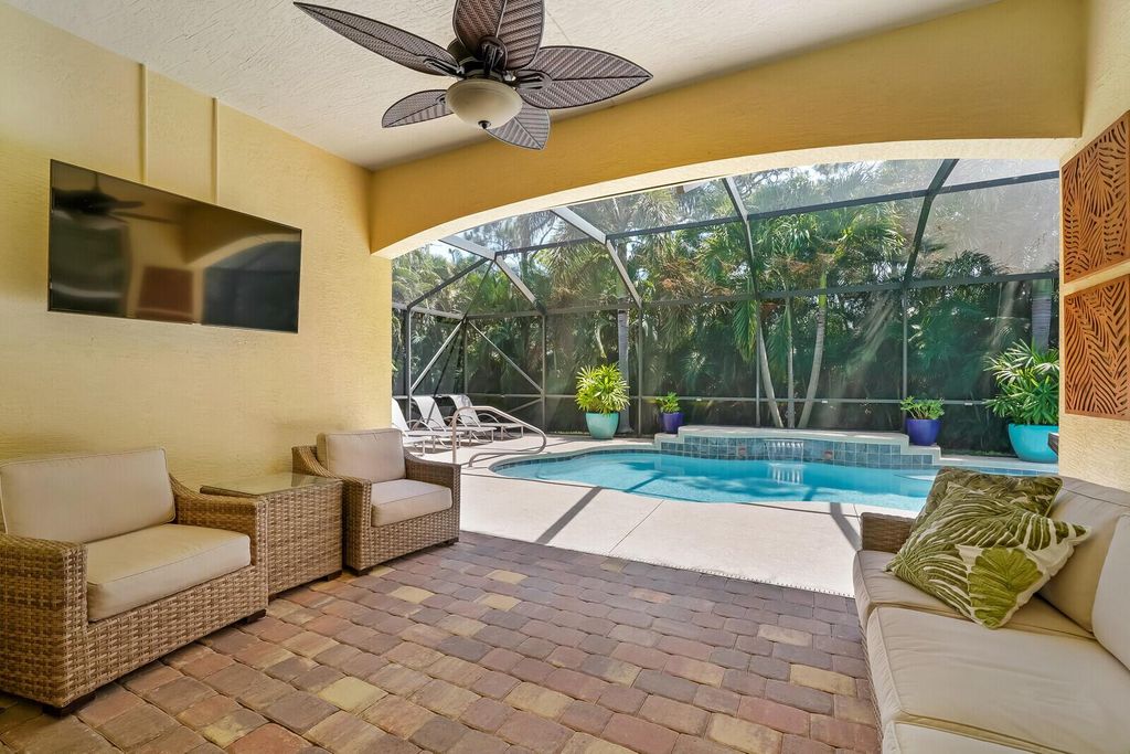 Photo of 521 NE Abaca Way, Jensen Beach, FL 34957 (MLS # R10986578)