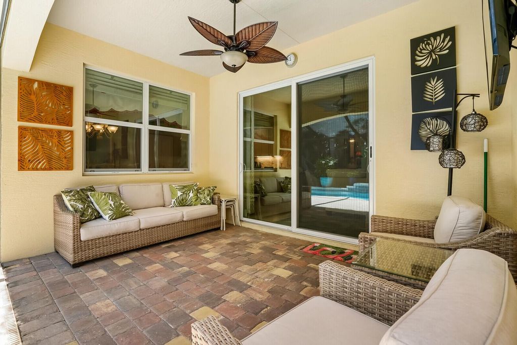 Photo of 521 NE Abaca Way, Jensen Beach, FL 34957 (MLS # R10986578)