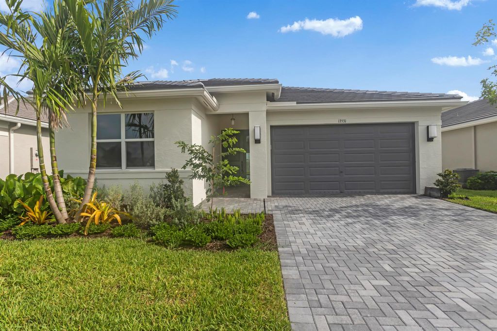Photo of 13531 SW Indigo Inlet Lane, Port Saint Lucie, FL 34987 (MLS # R11001339)