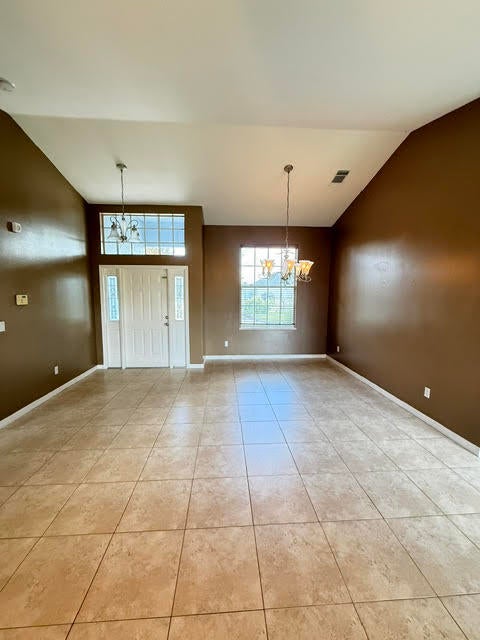 Photo of 1319 SW Granville Avenue, Port Saint Lucie, FL 34953 (MLS # B26037847)
