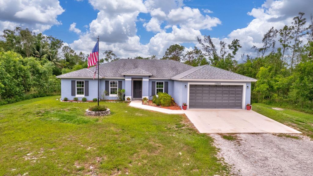 Photo of 12946 63rd Lane N, The Acreage, FL 33412 (MLS # R11096464)
