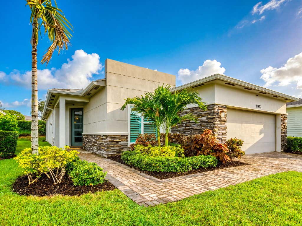 Photo of 11957 SW Lyra Drive, Port Saint Lucie, FL 34987 (MLS # B26046790)