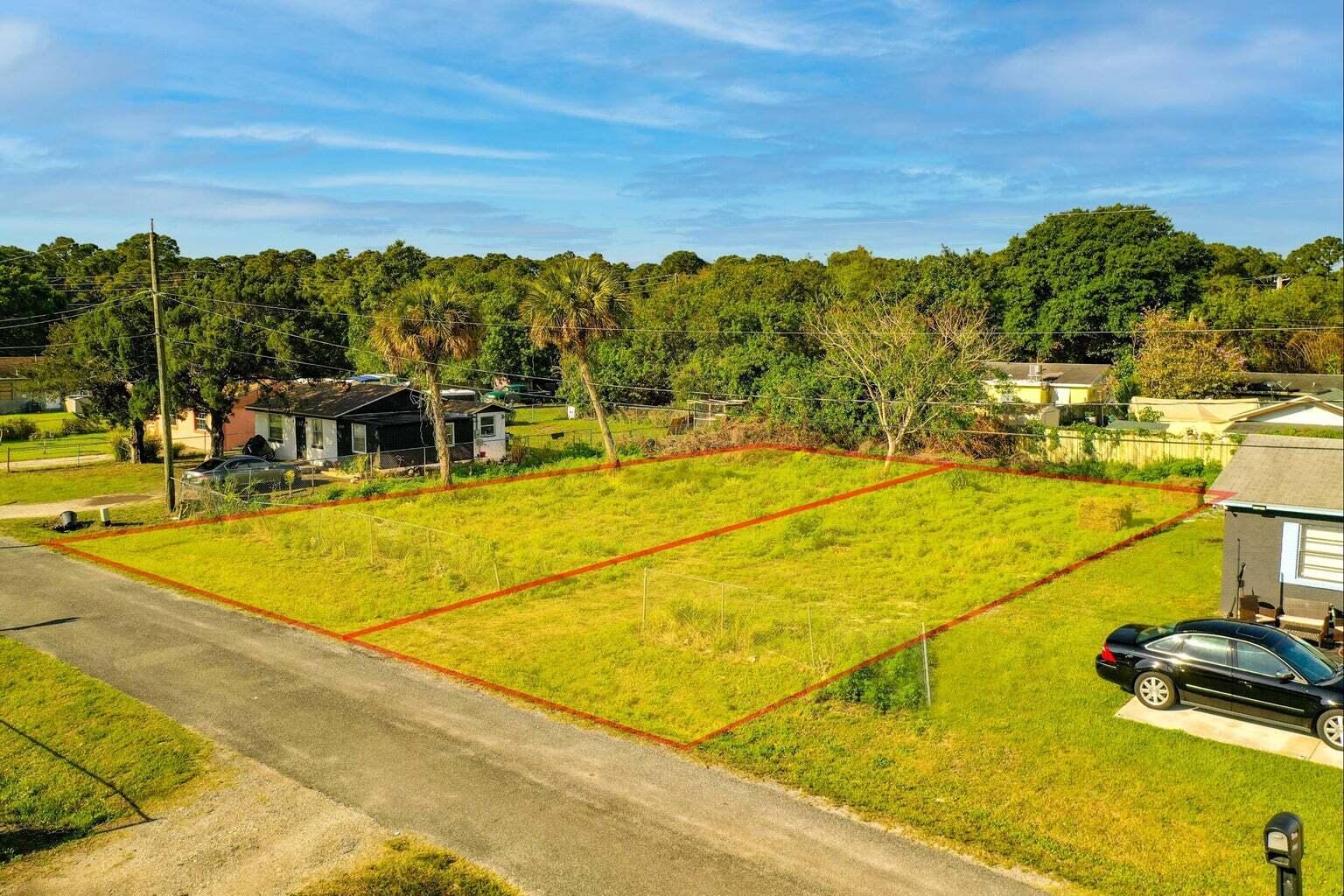 CLEAN, 2 lots together to make 0.26 ac, a 1/4 ACRE. The only Lot without a house in the St yet. is a DEAD END Rd, ALL Utilities Available. Build your dream home here or used as investment. Close to Angle Rd, and Evergreen Ave Corner. Across The St from The New Fort Pierce Westwood AcademyLots are easy to easy to see from Evergreen Ave, and right where said DEAD END signPLEASE READ THE DIRECTIONS