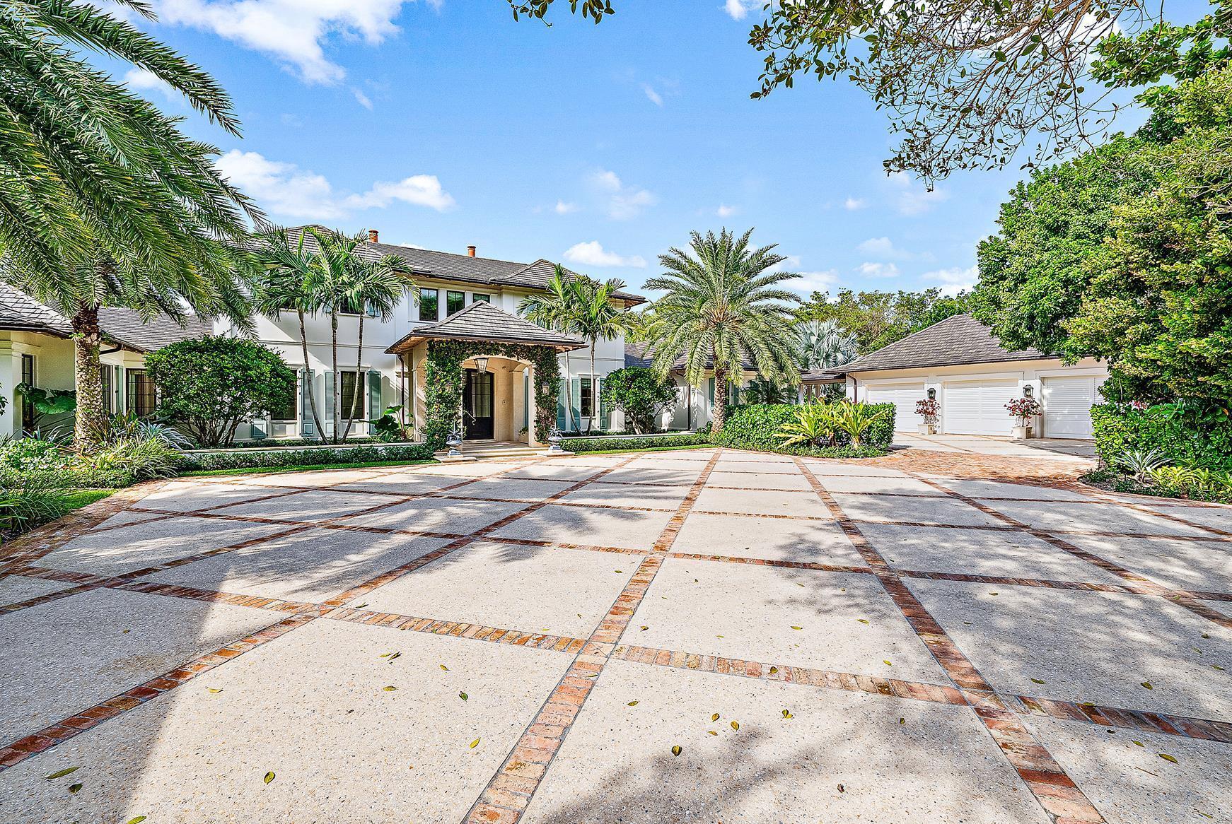 Welcome to 420 S Beach Road, a truly magnificent, private family compound centrally located in Jupiter Island. Originally known as ''The Quarry,'' this estate was completed in December of 2018 and sits on 2.7 acres of one of the highest elevations in Hobe Sound. 263 feet of Intracoastal frontage provide for stunning panoramic views of the Intracoastal and preserve. The outdoor amenities include a dock with a boat lift and a sandy beach area to the water. The property also comes with deeded beach access conveniently located a stone's throw away.