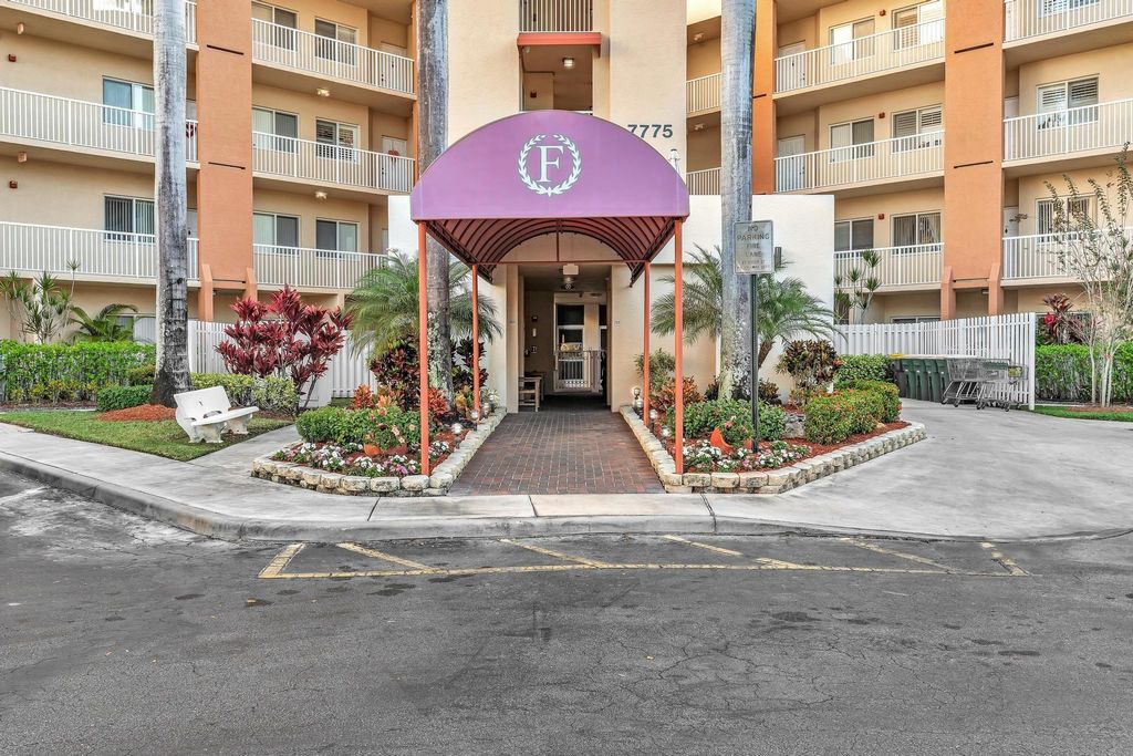 Photo of 7775 Yardley Dr #110, Tamarac, FL 33321 (MLS # F10533608)