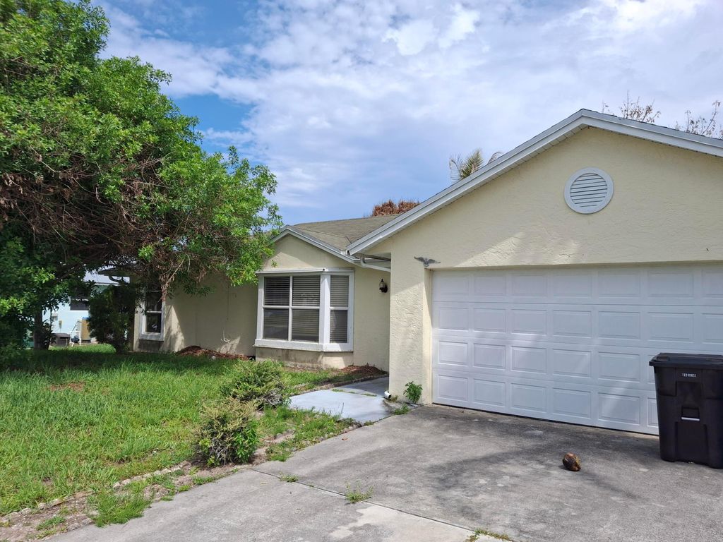 Photo of 374 SW De Gouvea Terrace, Port Saint Lucie, FL 34984 (MLS # B26036624)