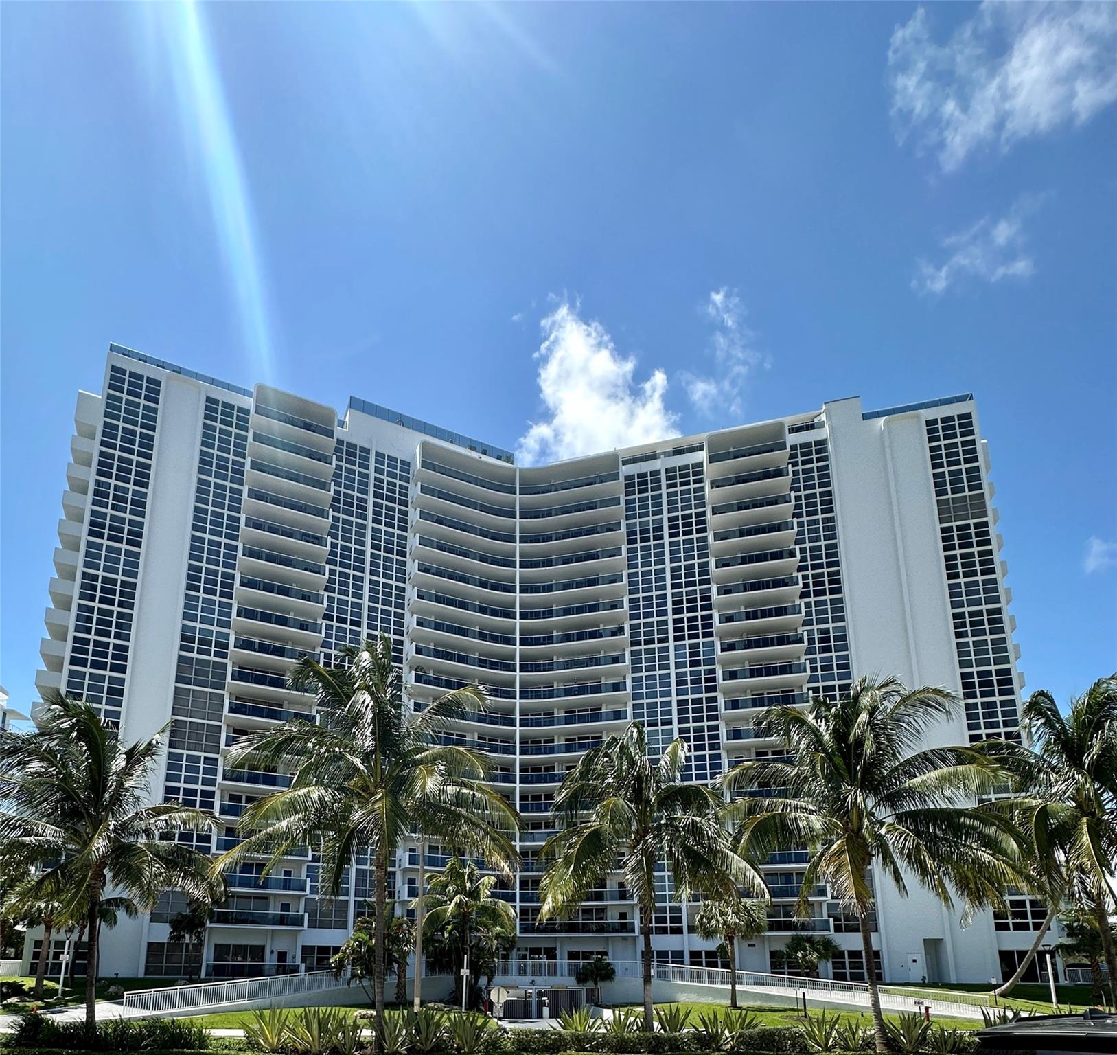 Spectacular Ocean, Intracoastal and City Views from the Rooftop Pool. 2/2 Feels like your own private beachside retreat, unfurnished Condo with Impact Windows & Washer/Dryer in unit. Enjoy the Sauna and work out while enjoying the views of the ocean in the fully equipped Gym. Private patio and parking close to the unit. Walk to the Beach, New Publix next door and the many Restaurants & Shops close by. Hop onto the Water taxi at Shooters. Management and lobby attendant on site. Trash is located on the 2nd floor.