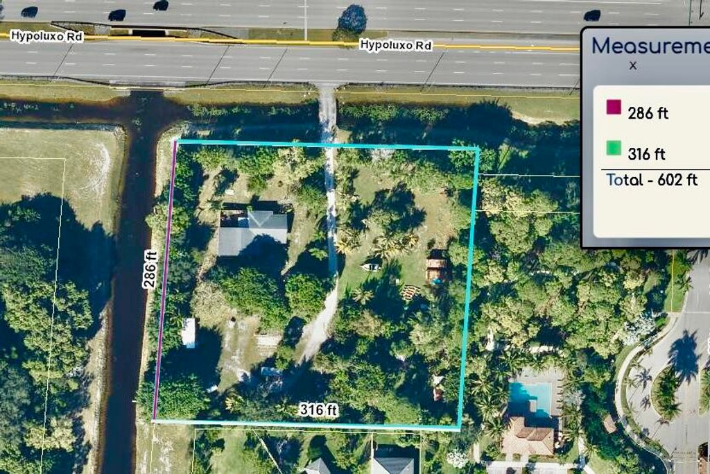 Photo of 5947 Hypoluxo Road, Lake Worth, FL 33463 (MLS # B26004963)