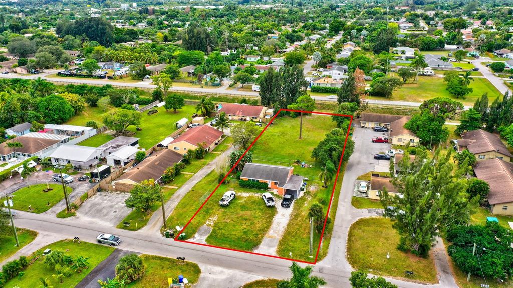 Photo of 3856 7th Avenue N, Palm Springs, FL 33461 (MLS # R10982789)