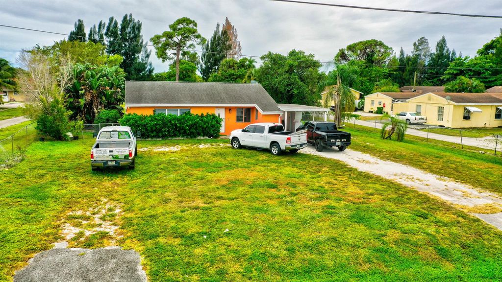 Photo of 3856 7th Avenue N, Palm Springs, FL 33461 (MLS # R10982789)