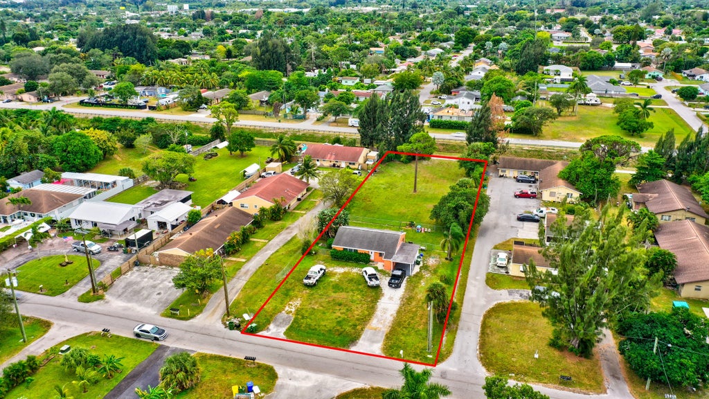 Photo of 3856 7th Avenue N, Palm Springs, FL 33461 (MLS # R10982789)