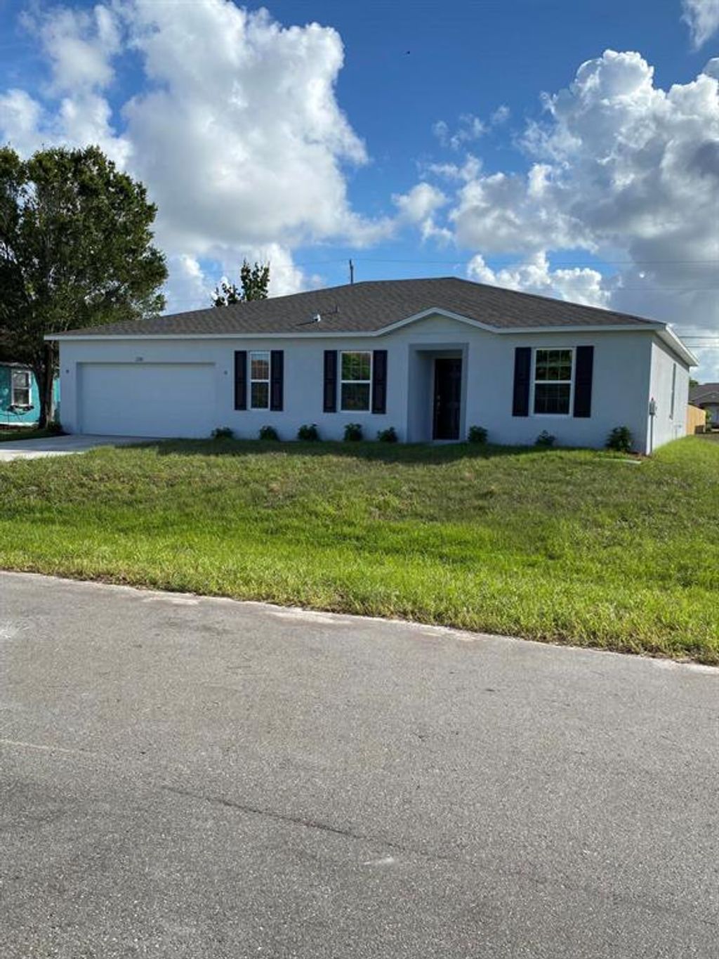 Photo of 2281 SE Mandrake Circle Cir, Port Saint Lucie, FL 34952 (MLS # R10822614)