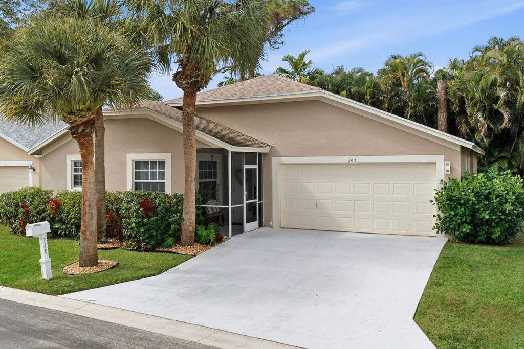 Photo of 340 Hammocks Trail, Greenacres, FL 33413 (MLS # R11161183)
