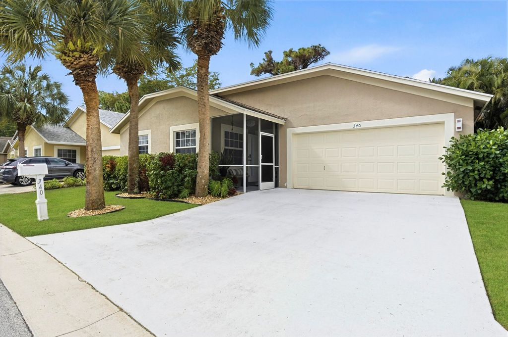 Photo of 340 Hammocks Trail, Greenacres, FL 33413 (MLS # R11161183)