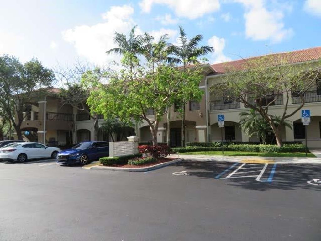 Photo of 7451 Wiles Road, Coral Springs, FL 33067 (MLS # F10555933)