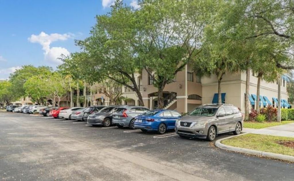 Photo of 7451 Wiles Road, Coral Springs, FL 33067 (MLS # F10555933)