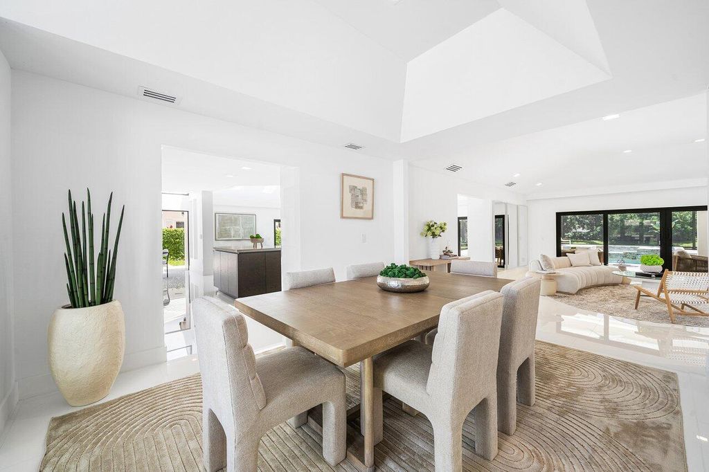 Photo of 1648 Breakers West Boulevard, West Palm Beach, FL 33411 (MLS # B26025988)
