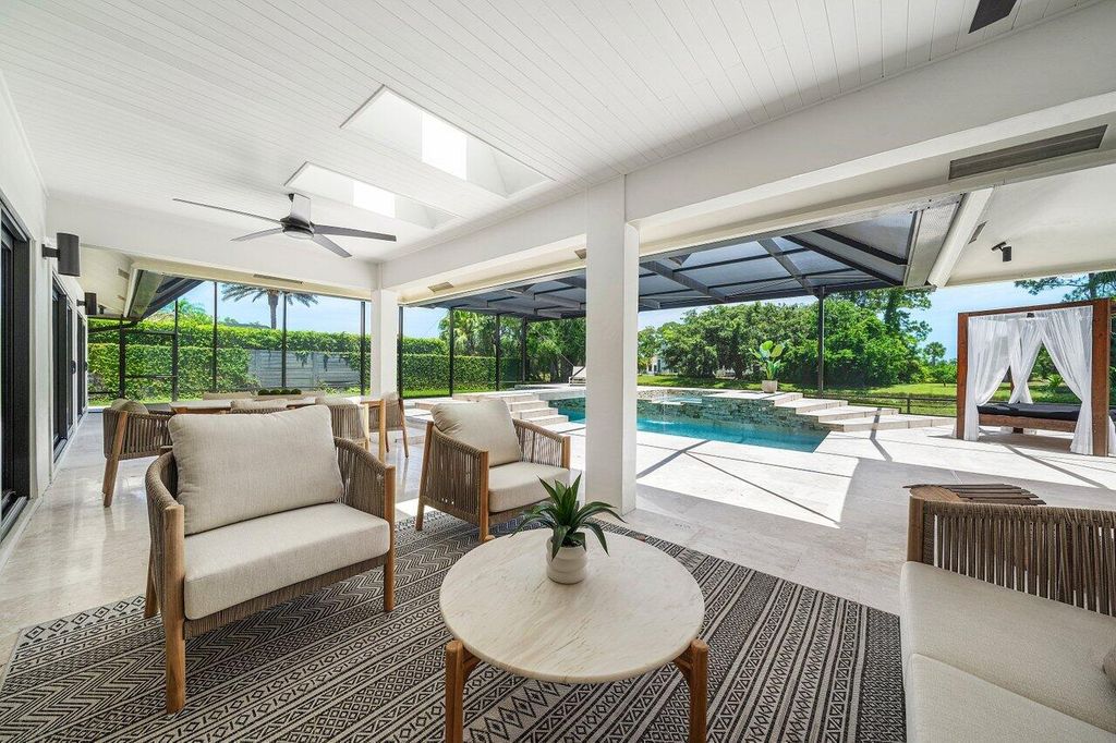 Photo of 1648 Breakers West Boulevard, West Palm Beach, FL 33411 (MLS # B26025988)