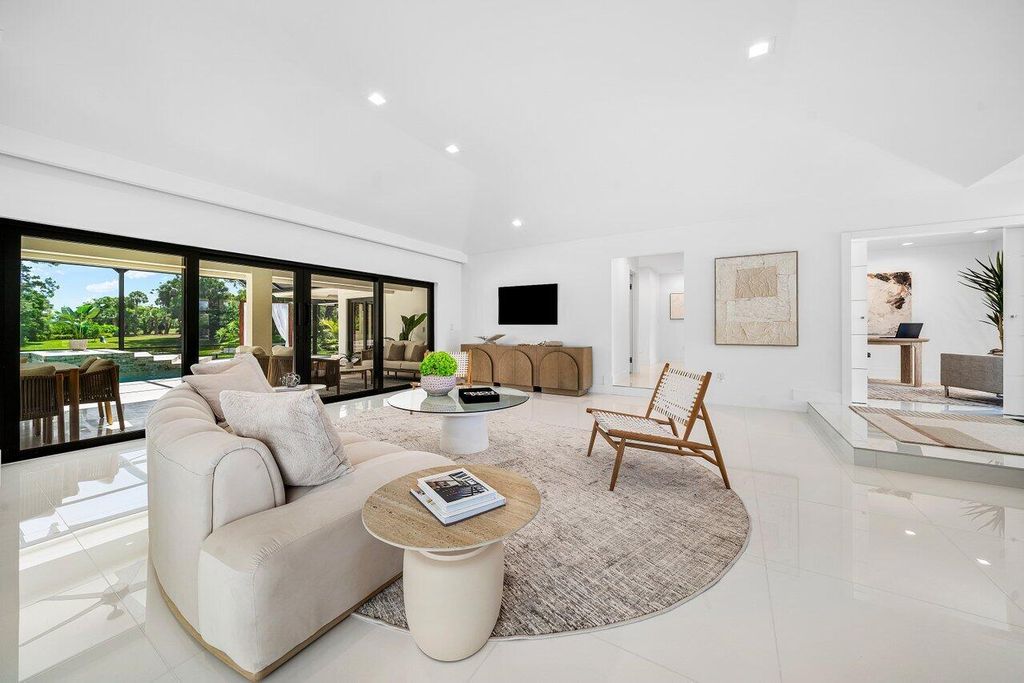 Photo of 1648 Breakers West Boulevard, West Palm Beach, FL 33411 (MLS # B26025988)