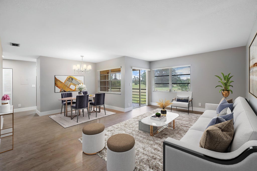 Photo of 5690 Princess Palm Court #D, Delray Beach, FL 33484 (MLS # R10960548)