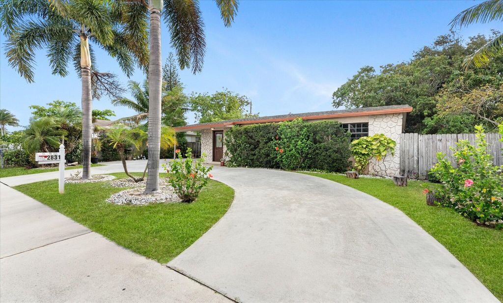 Photo of 2831 N Seacrest Boulevard, Boynton Beach, FL 33435 (MLS # B26022821)