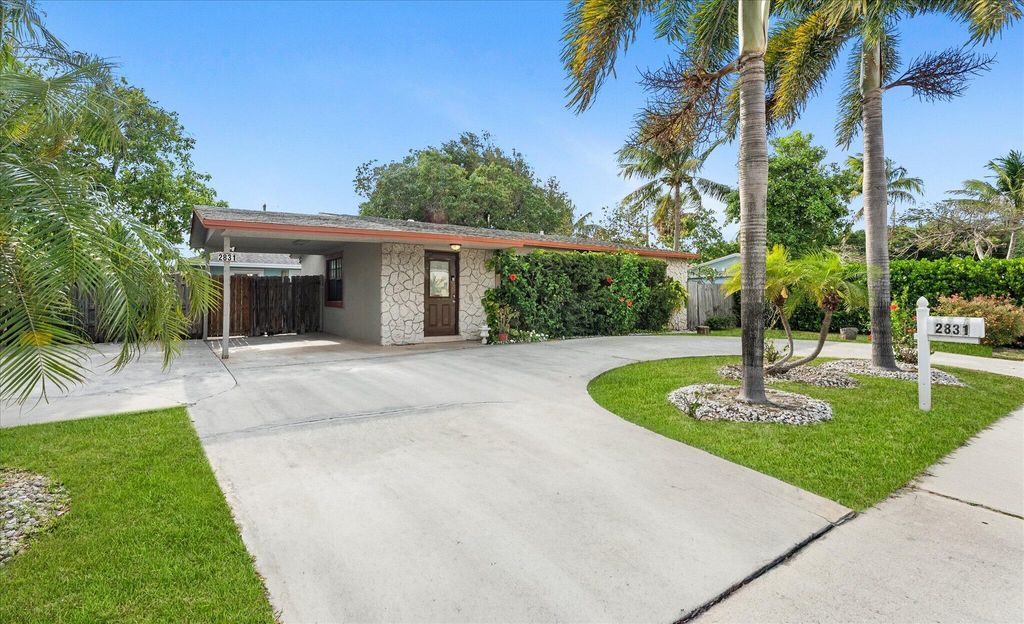 Photo of 2831 N Seacrest Boulevard, Boynton Beach, FL 33435 (MLS # B26022821)